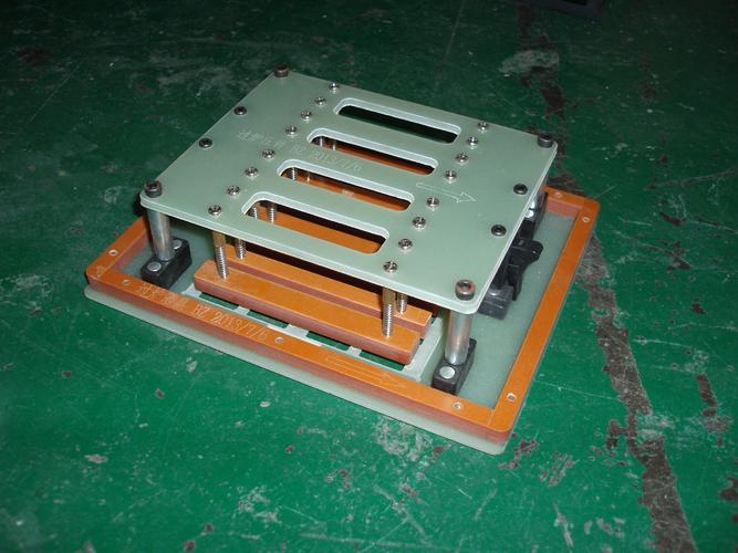 专业电子制造中的高精度治具 从过炉载具到纤维板治具的全面解析